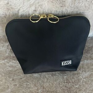 KUSSHI Elegant Black Cosmetic Pouch with Gold Accents,size Small